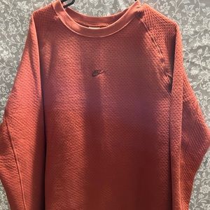 Nike quilted pullover.